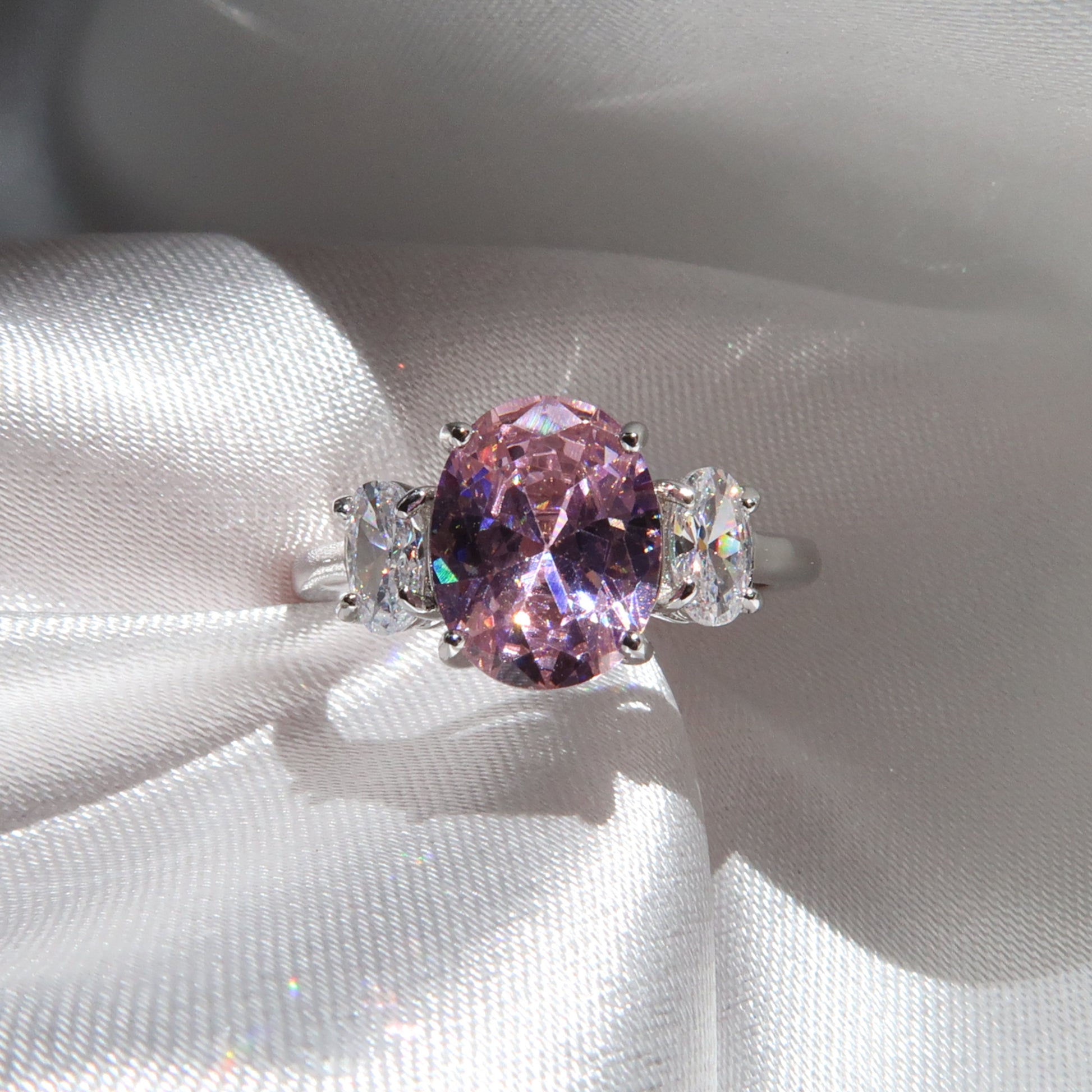 Ella Ring: 2 Carat Oval Pink Sapphire Three Stone Ring - Lush and Company