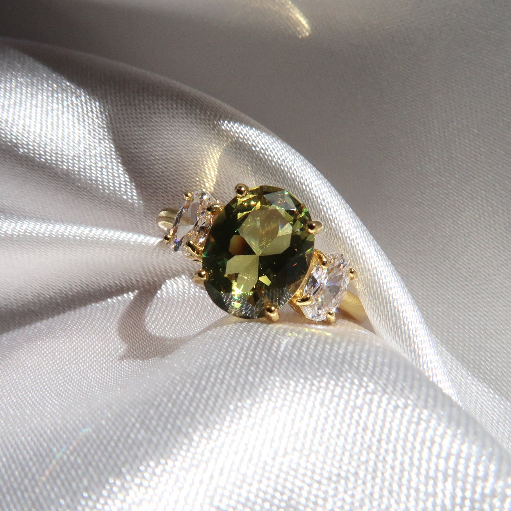 Ella Ring: 2 Carat Oval Peridot Three Stone Ring - Lush and Company