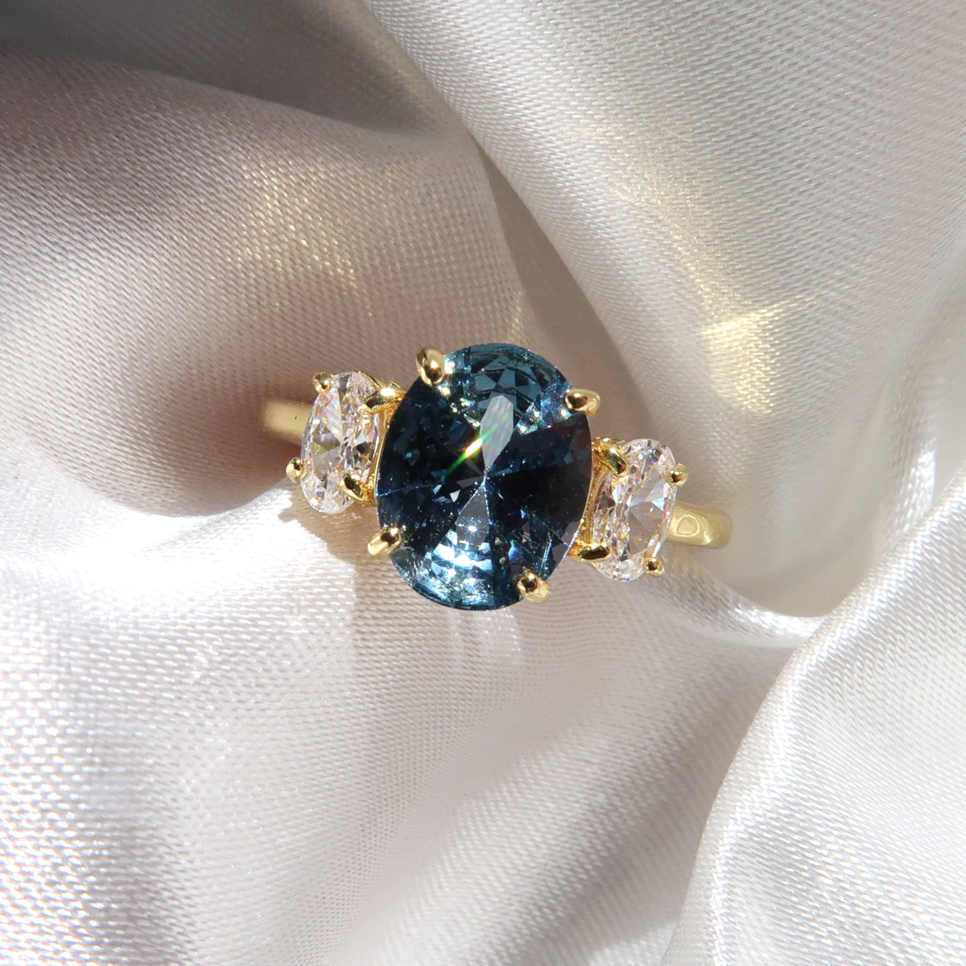 Ella Ring: 2 Carat Oval London Blue Topaz Three Stone Ring - Lush and Company