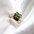 4 Carat Emerald Cut Peridot Three Stone Ring - Lush and Company