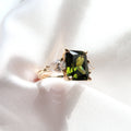 4 Carat Emerald Cut Peridot Three Stone Ring - Lush and Company